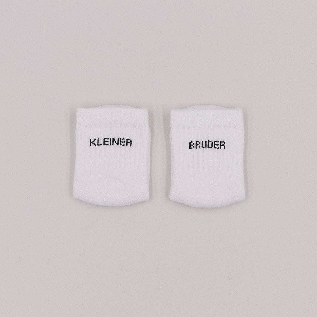 Eulenschnitt - Babysocken "Kleiner Bruder"